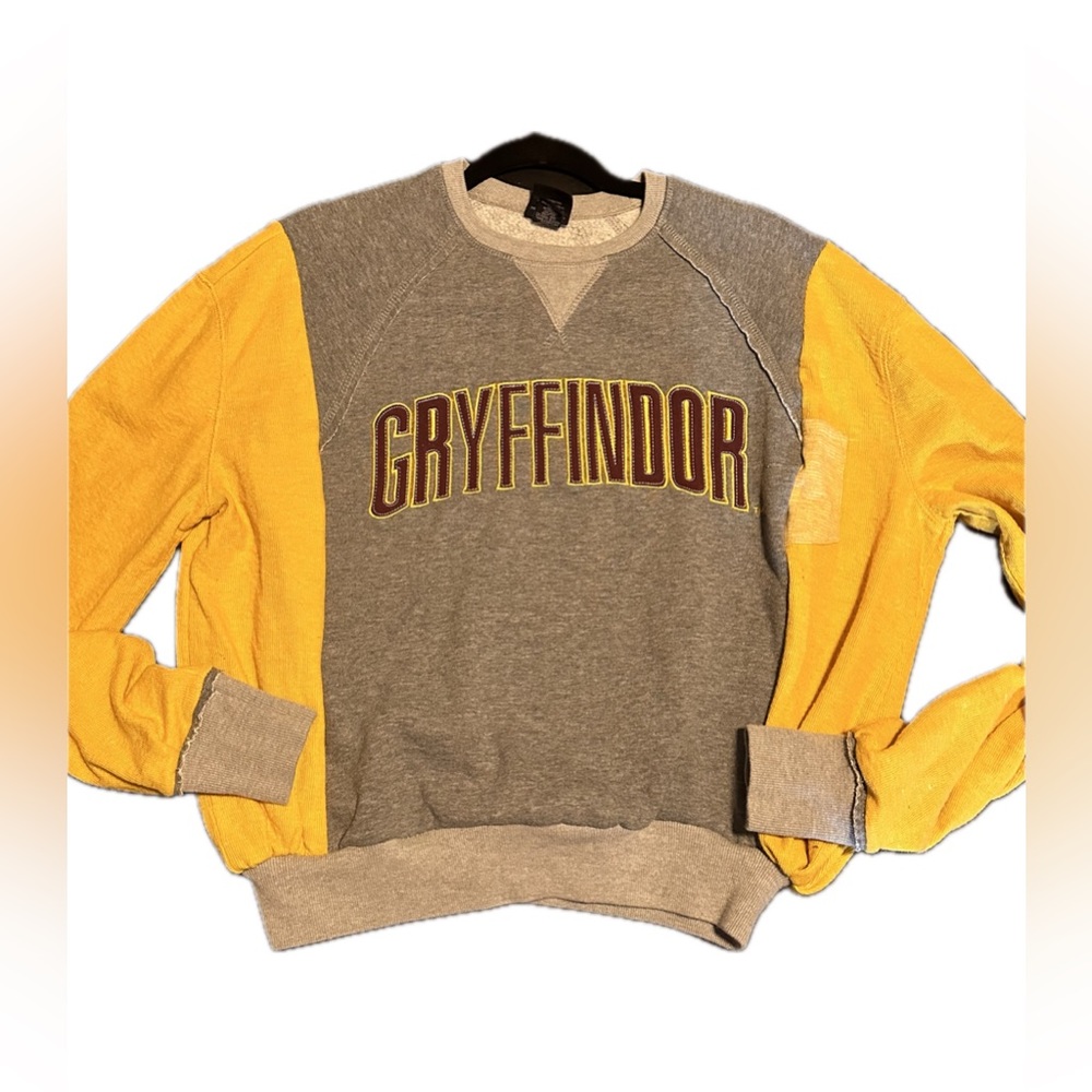 Gryffindor repurposed shirt, new sleeves added. Unisex. Size fits a small/medium